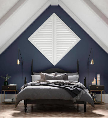 A diamond shaped bespoke window shutters. Shutters can be made in a variety of special shapes.